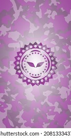 wings icon inside pink camouflaged emblem. 
