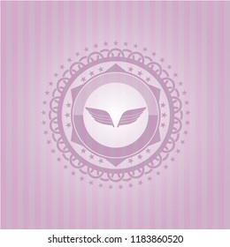 wings icon inside pink emblem. Retro