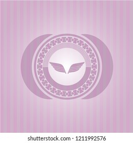 wings icon inside pink emblem. Vintage.