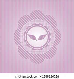 wings icon inside pink emblem. Vintage.