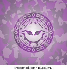 wings icon inside pink and purple camouflage texture