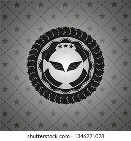 wings icon inside realistic black emblem