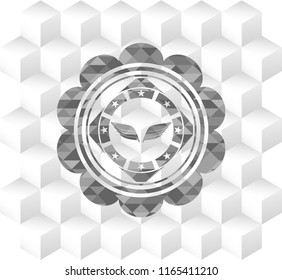 wings icon inside realistic grey emblem with cube white background