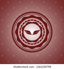 wings icon inside red emblem. Retro