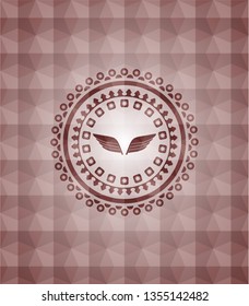wings icon inside red emblem or badge with abstract geometric polygonal pattern background. Seamless.