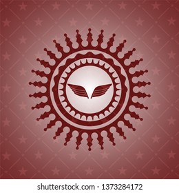wings icon inside red icon or emblem