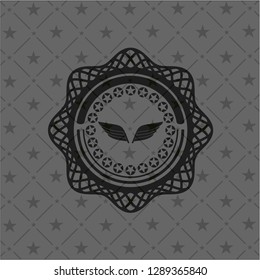 wings icon inside retro style black emblem