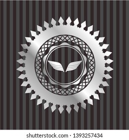 wings icon inside silver shiny emblem