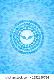 wings icon inside sky blue emblem with triangle mosaic background