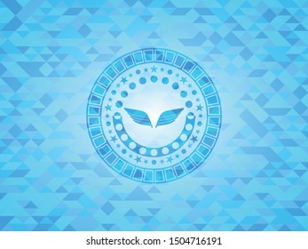 wings icon inside sky blue emblem with mosaic background