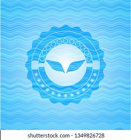 wings icon inside water representation badge background.