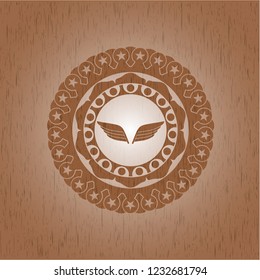 wings icon inside wood emblem. Retro