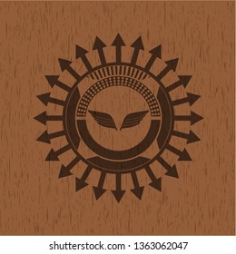 wings icon inside wood emblem