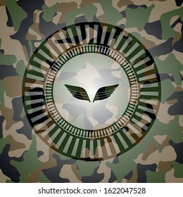 wings icon on camouflage texture