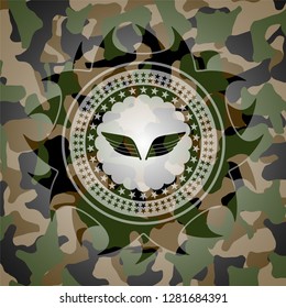 wings icon on camouflaged pattern