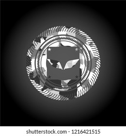 wings icon on grey camouflage texture