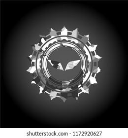 wings icon on grey camouflaged pattern