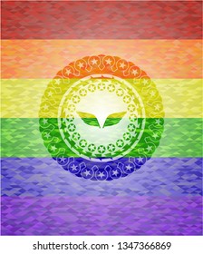 wings icon on mosaic background with the colors of the LGBT flag