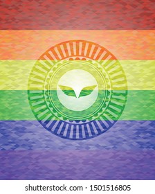 wings icon on mosaic background with the colors of the LGBT flag