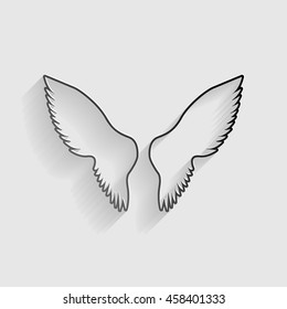 Wings sign illustration. Black paper with shadow on gray background.