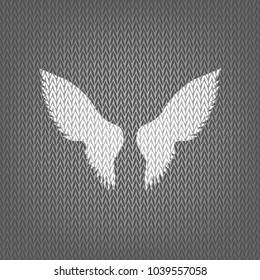 Wings sign illustration. Vector. White knitted icon on gray knitted background. Isolated.