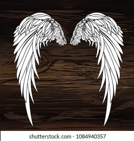 Wings. Vector illustration on wooden background. Black and white style.