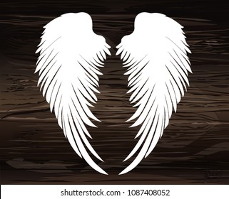 Wings. Vector illustration on wooden background. Black and white style.