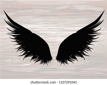 Wings. Vector illustration on wooden background. Black and white style.