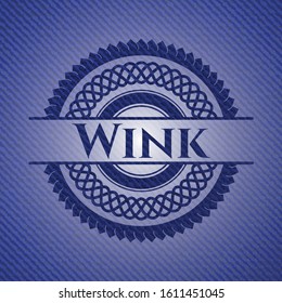 Wink badge with denim texture. Vector Illustration. Detailed.