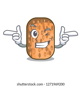 Wink fried tempeh in bowl character wooden