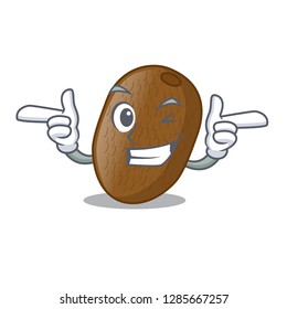 Wink kiwifruit on table of character wood