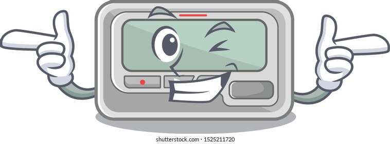 Wink pager placed above cartoon wooden table