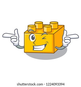 Wink plastic shaped toy on construction character