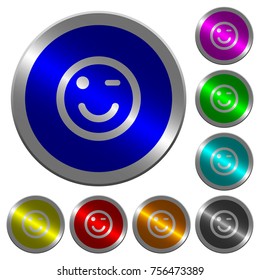 Winking emoticon icons on round luminous coin-like color steel buttons