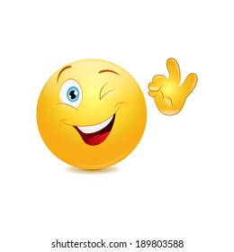 Winking emoticon showing ok sign