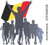 Winner with the Belgium flag at the finish