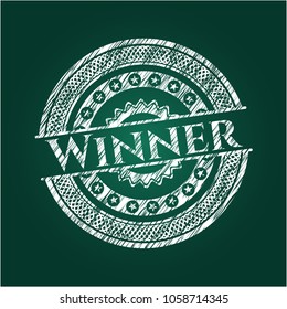 Winner chalkboard emblem written on a blackboard
