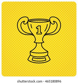 Winner cup icon. First place award sign. Victory achievement symbol. Linear icon on orange background. Vector