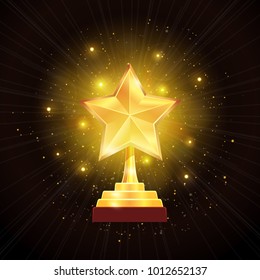 Winner Glowing Gold Star Trophy Award With Hazy Halo Of Lights On Black Background Realistic Vector Illustration 