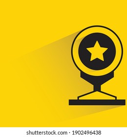 winner trophy or cup with shadow on yellow background