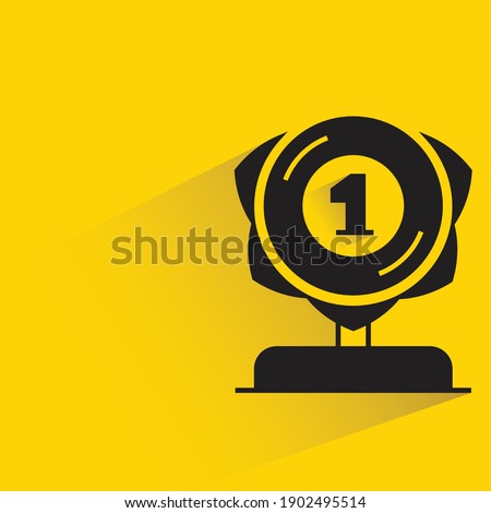 winner trophy or cup with shadow on yellow background