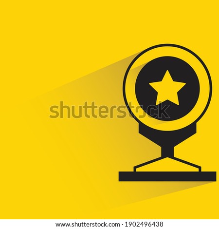 winner trophy or cup with shadow on yellow background