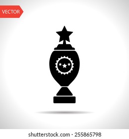 Winner's cup and ribbon - Vector icon isolated