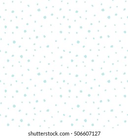 Winter abstract background. Falling snow flakes, uneven specks, spots, blobs, splashes seamless pattern. Free hand drawn speckles, flecks of different size texture. Light pastel colors.