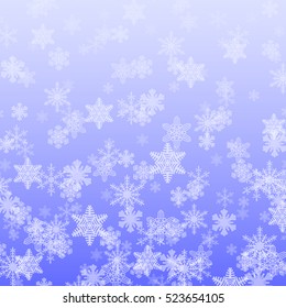 Winter abstract blue background with snowflakes