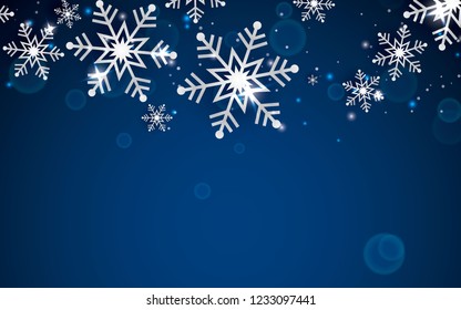 Winter abstract snowflake background in blue