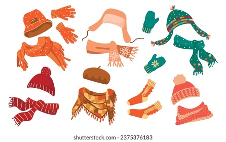 Winter accessories set.Collection of warm cozy things for cold weather. Knitted hats, scarves, gloves, mittens, beret, socks.Colorful clothes isolated on white background.Vector cartoon illustration.