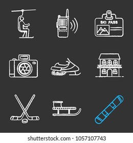 Winter activities chalk icons set. Snowboard, sled, photo camera, walkie talkie, chairlift, ski pass badge, ice hockey sticks and puck, snowmobile, hotel. Isolated vector chalkboard illustrations