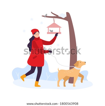 Winter activities. Girl walking with dog and feeding birds. Woman character in winter clothing spending time outdoor with pet. Feeder hanging on tree branch with birds vector illustration