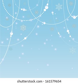 winter background with beads and sparkling snowflakes